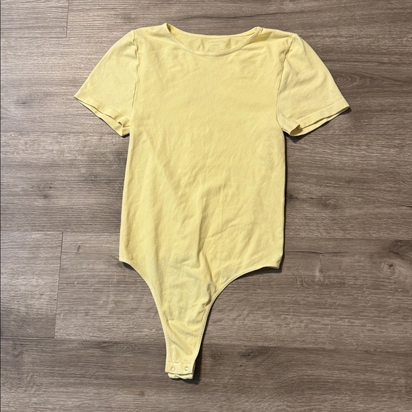 Free People Tops - Free People “Intimately” Clean Lines Tee Bodysuit — Butter